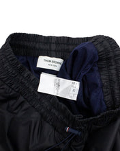 Load image into Gallery viewer, Thom Browne Navy Track Joggers Pants Front Tags