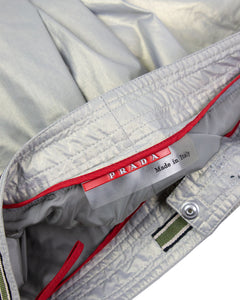 Prada shimmer cargo pants brand tag 